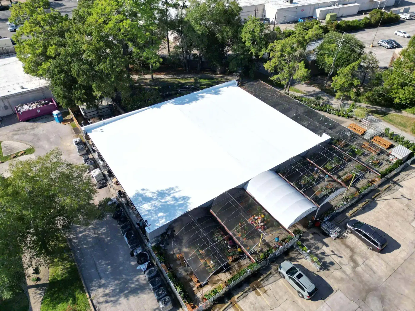 TPO roofing membrane installation on a commercial flat roof — Central Texas
