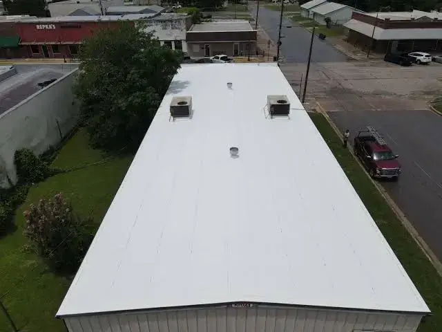 Flat roof membrane installation — Central Texas
